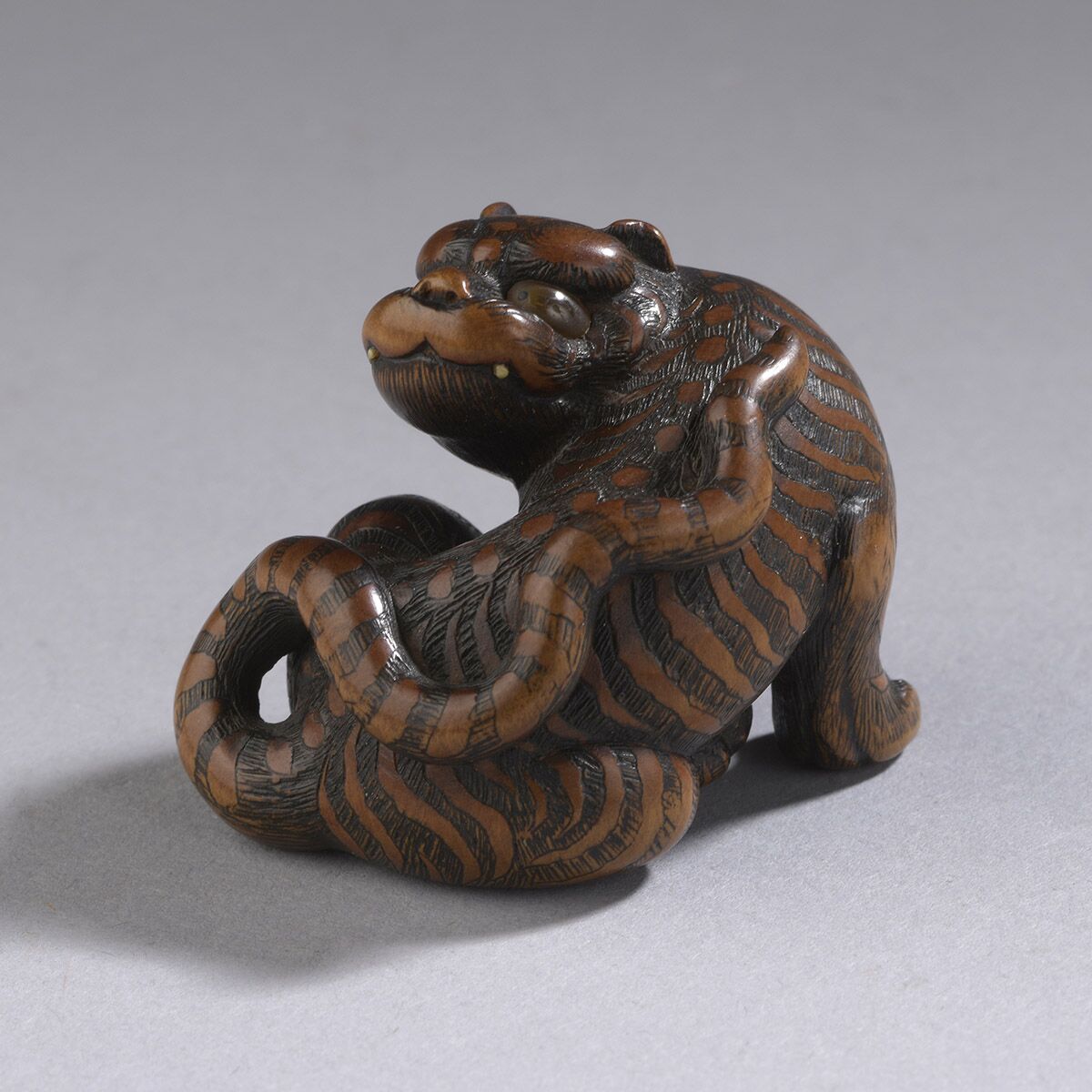 Wood-netsuke-of-a-seated-tiger-mr3984_v. 1